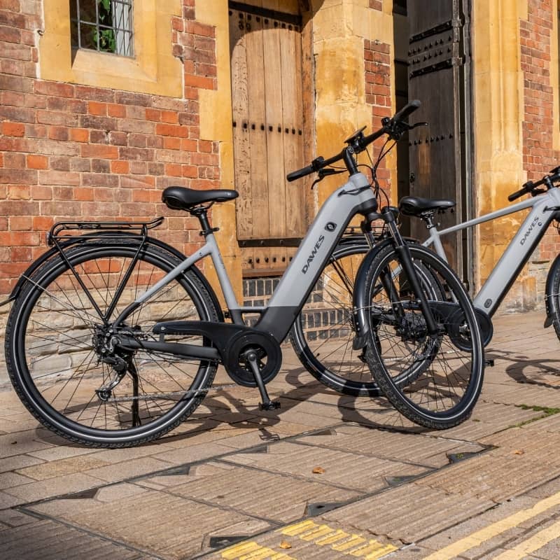 Dawes Spire 2.0 Low Step Electric Hybrid Bike Both Bikes Outside