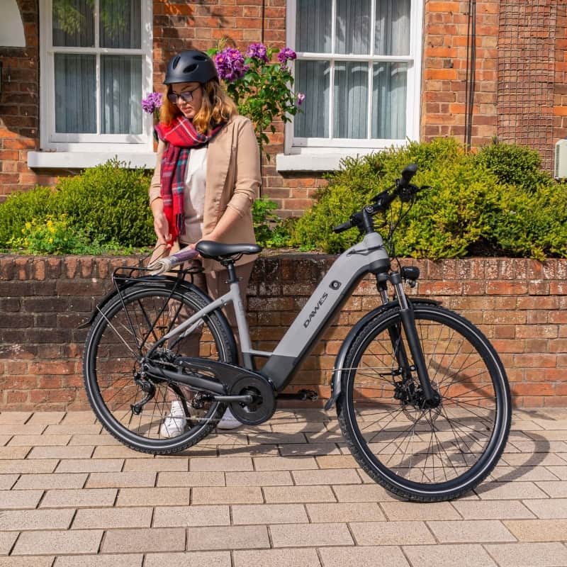 Dawes Spire 2.0 Low Step Electric Hybrid Bike Outside with Owner