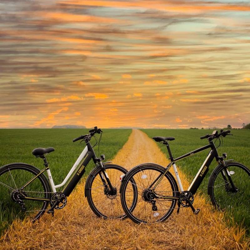 Mark2 X-Cross 520 Hybrid Electric Bike In Field Both Bikes